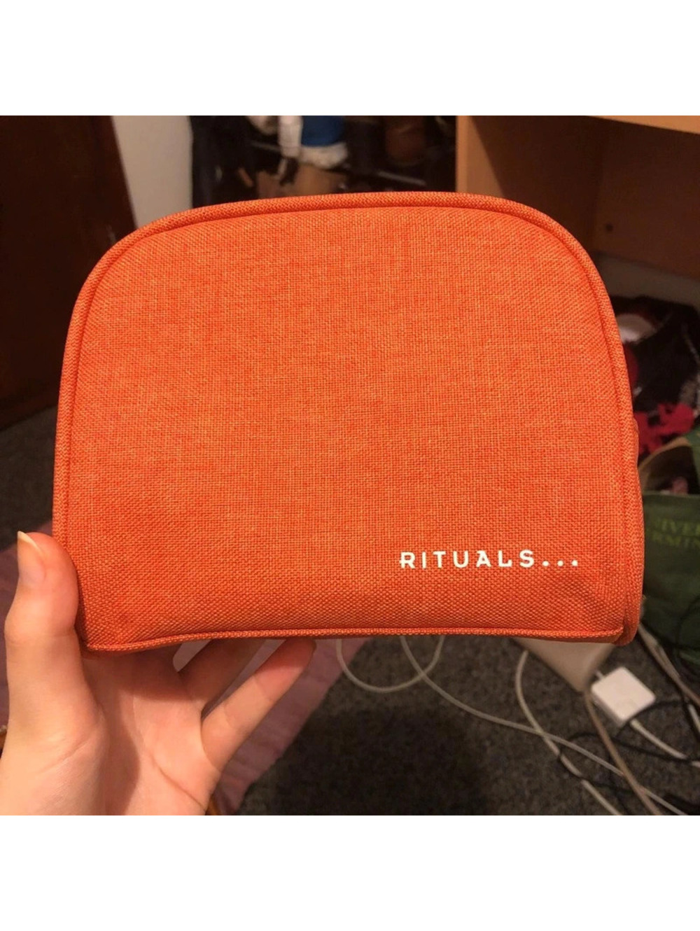 Brand new orange rituals make up bag